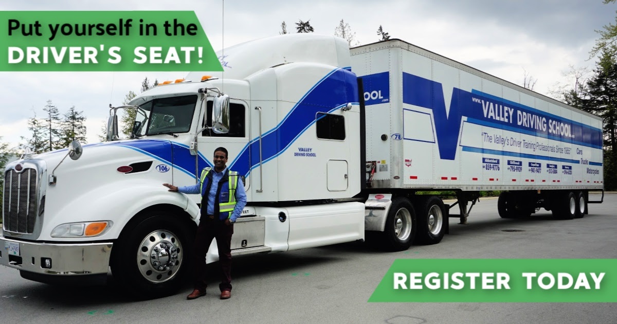 A smiling man in a safety vest standing next to a large white Valley Driving School semi-truck with text that says "Put yourself in the DRIVER'S SEAT!" and "REGISTER TODAY."