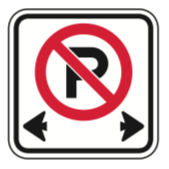 A white regulatory sign with a red circle and slash over a letter P, indicating no parking.