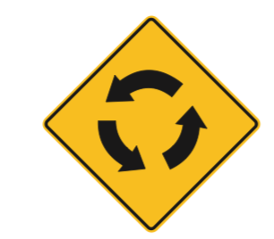 A diamond-shaped yellow warning sign with three arrows in a circular pattern representing a roundabout.